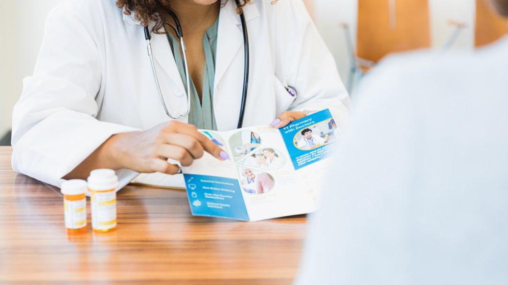 Physician sharing PSP registration details with a patient.